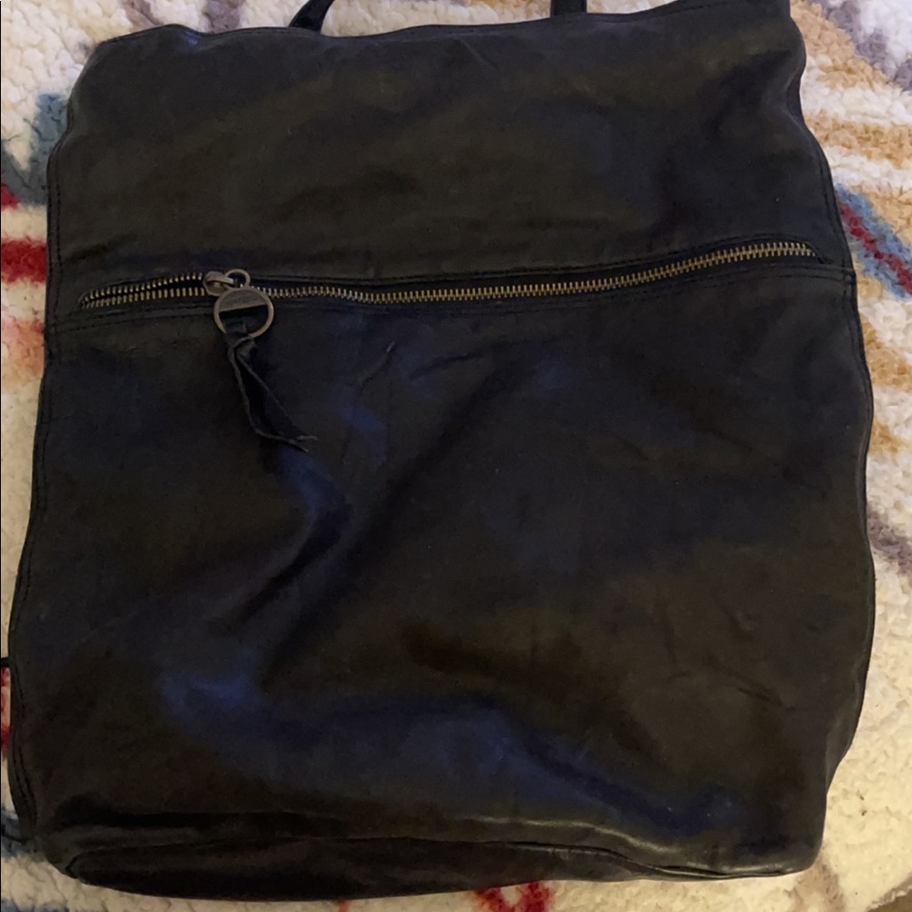 Margot Black Hobo Style relaxed/distressed Leather backpack. Large in size.